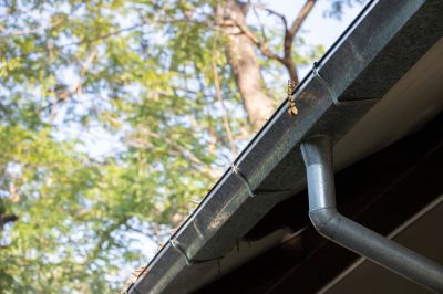 Steel Gutter Installation on a Home